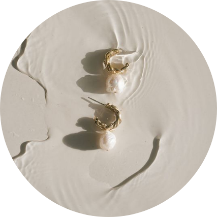 pearl earings in water