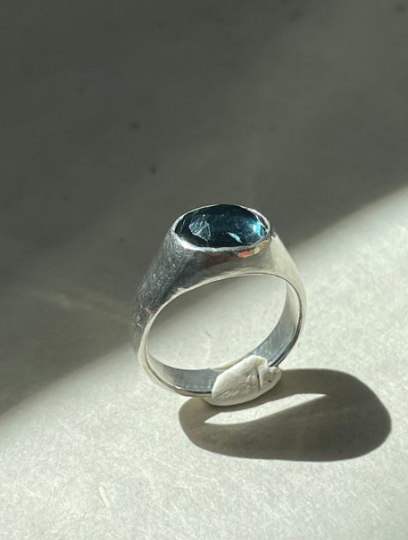 silver ring with blue stone