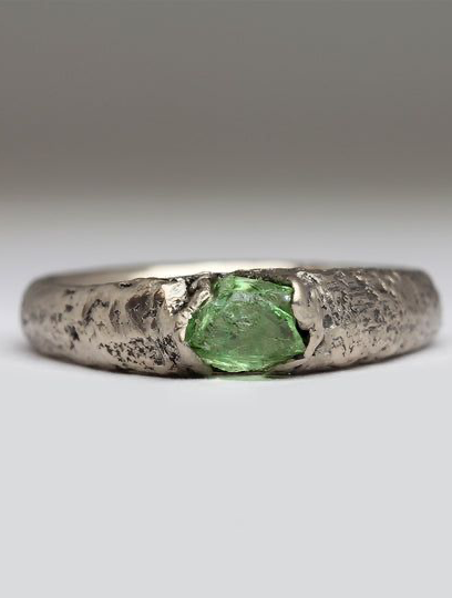 silver ring with green stone